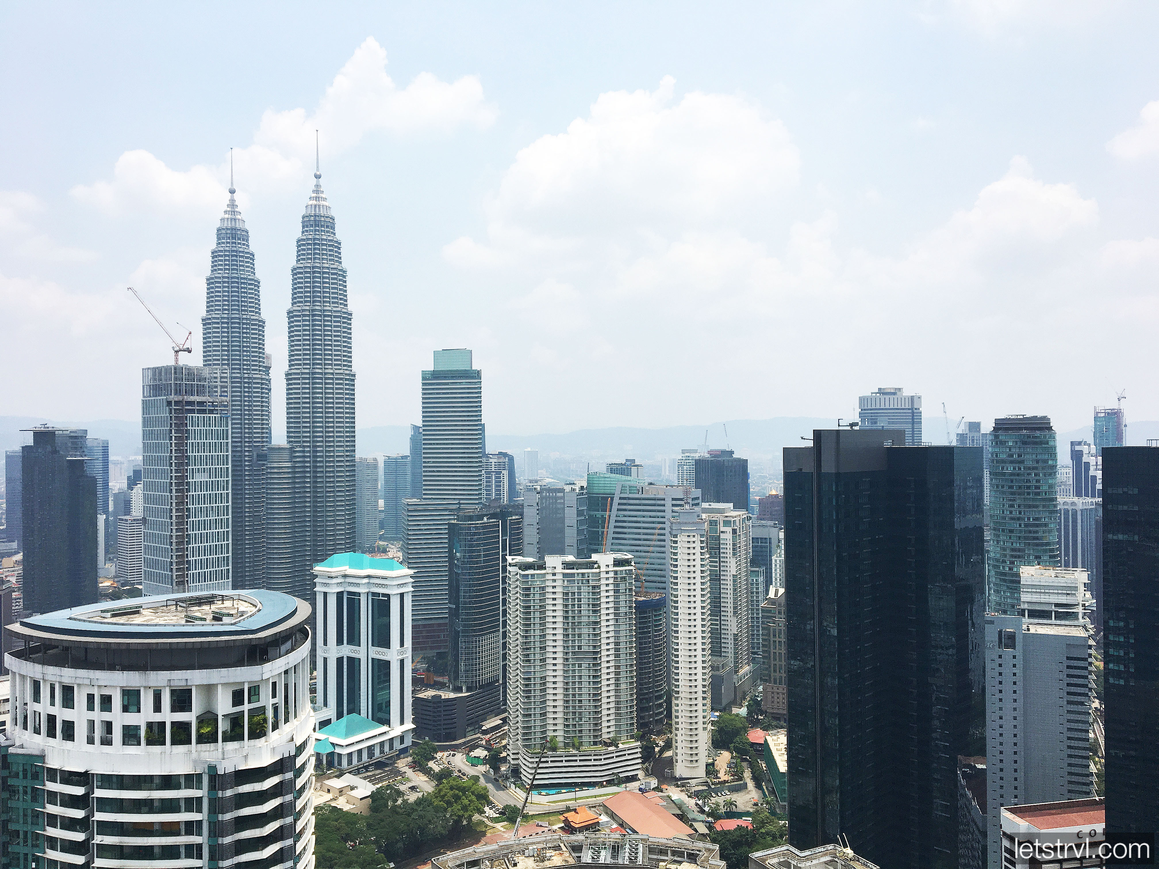 Вид на Куала-Лумпур и башни Петронас